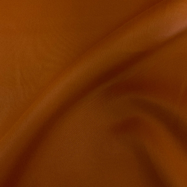 Sunbrella Luminous Nutmeg Solid Orange Outdoor Upholstery Fabric
