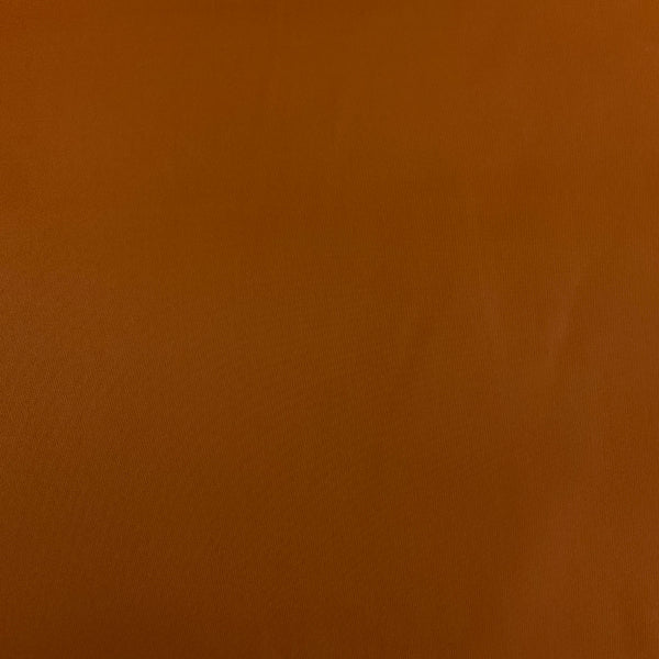 Sunbrella Luminous Nutmeg Solid Orange Outdoor Upholstery Fabric